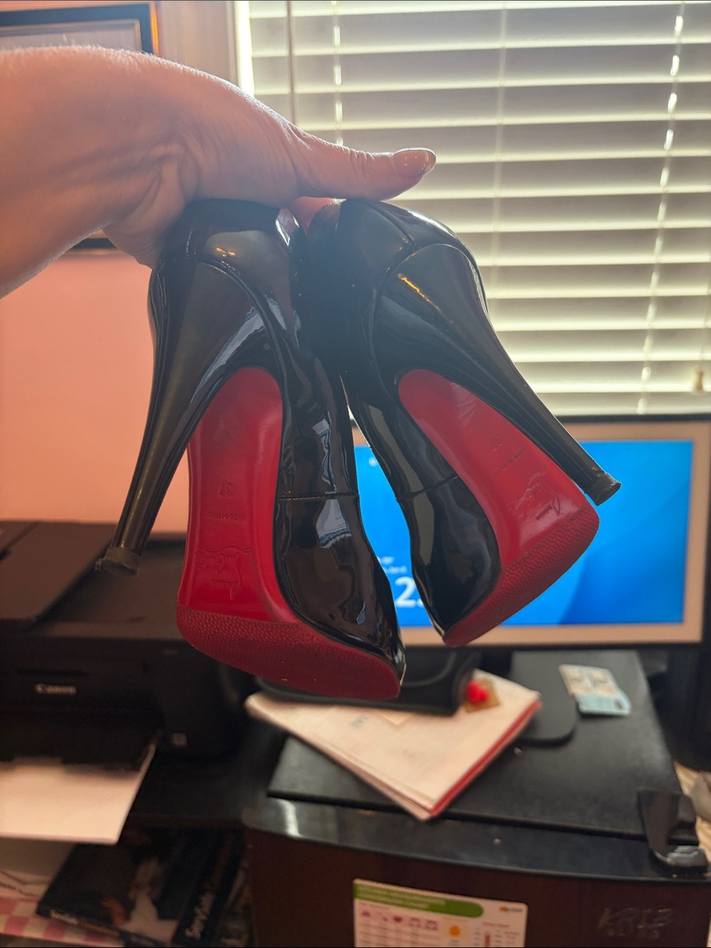 Christian Louboutin Black Patent Pumps with Red Soles